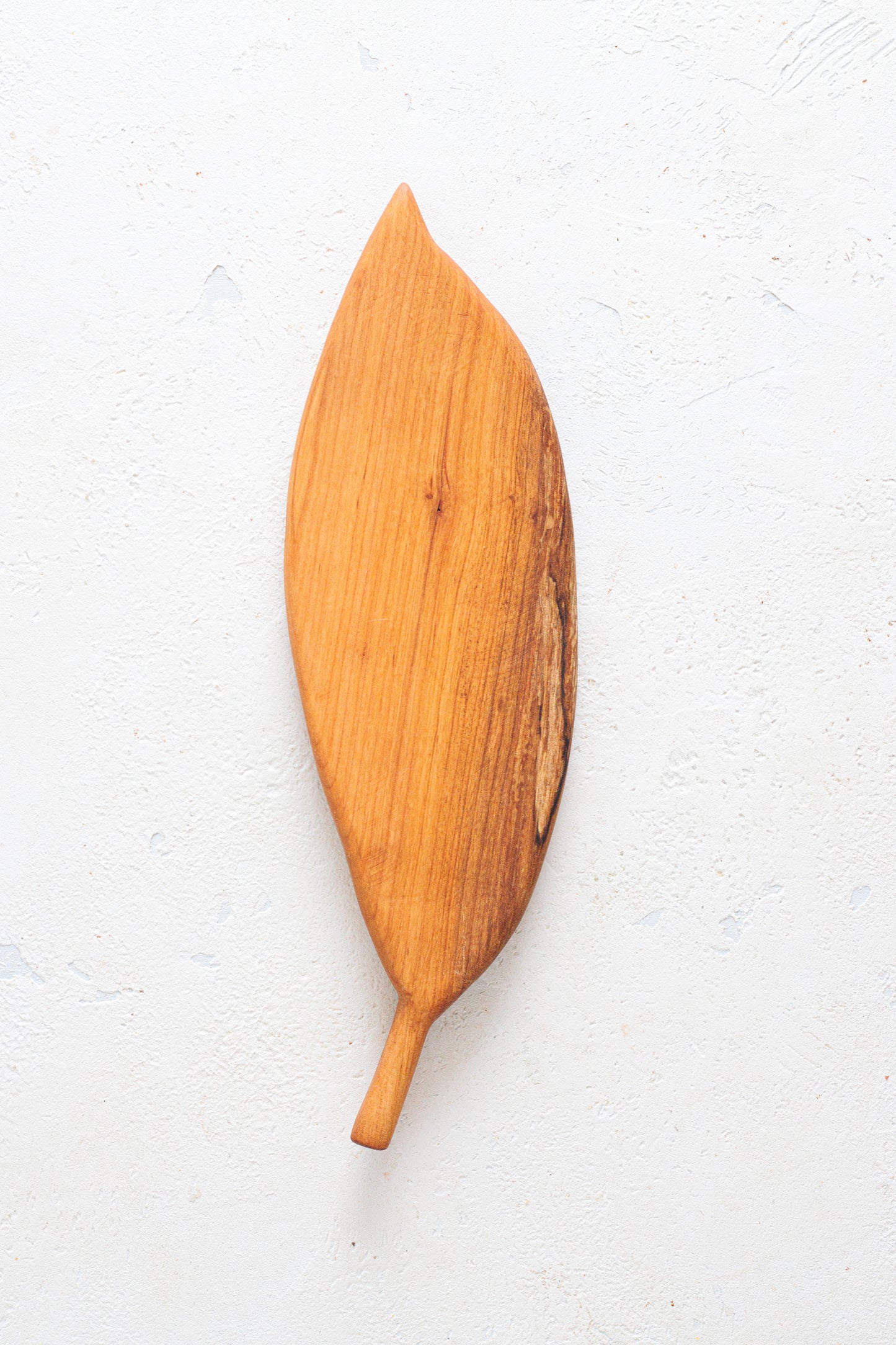 Tagliere a foglia in legno di ciliegio - Svolazzo